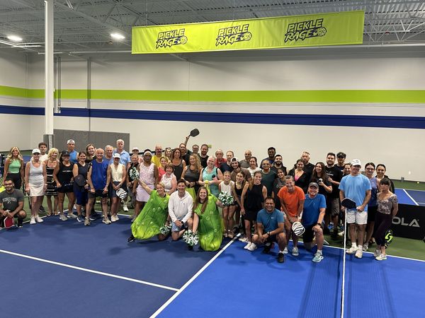 Group of people at a Pickleball court